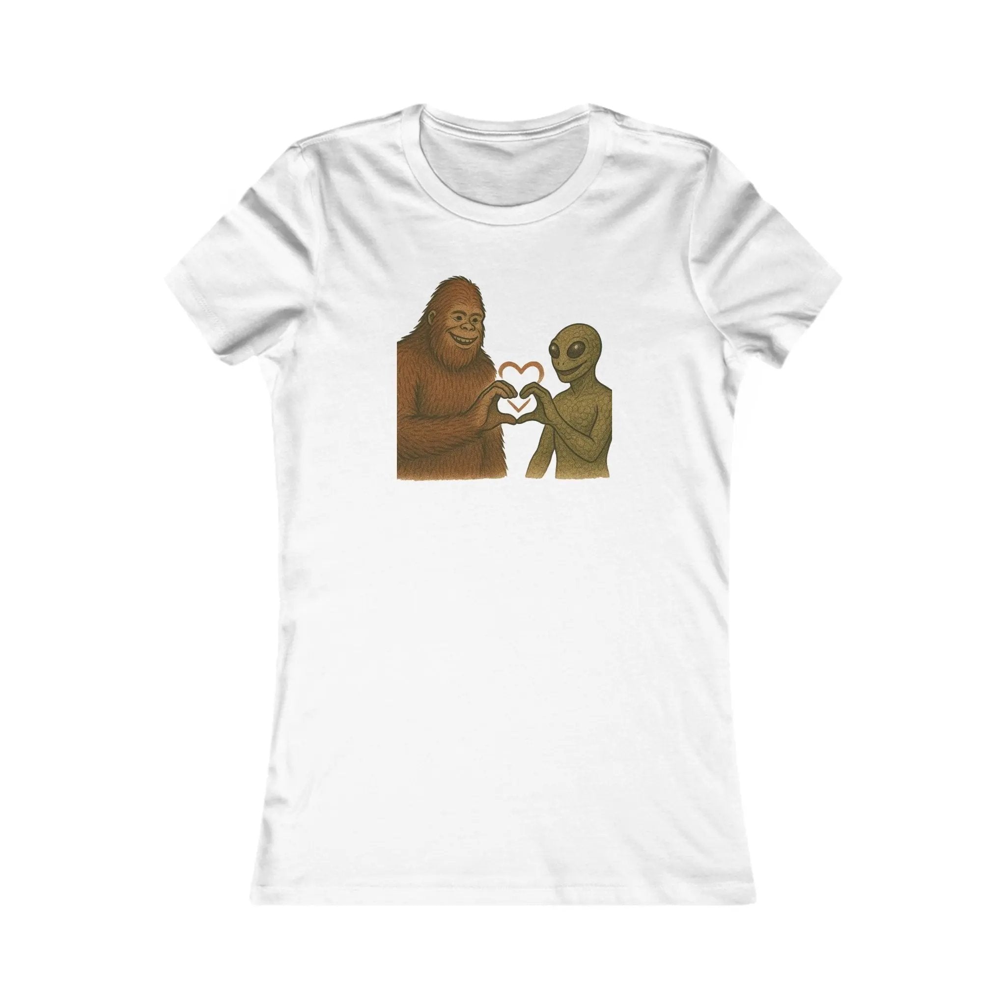 White t-shirt with a graphic of a bigfoot and alien holding hands with a heart symbol on a white background.