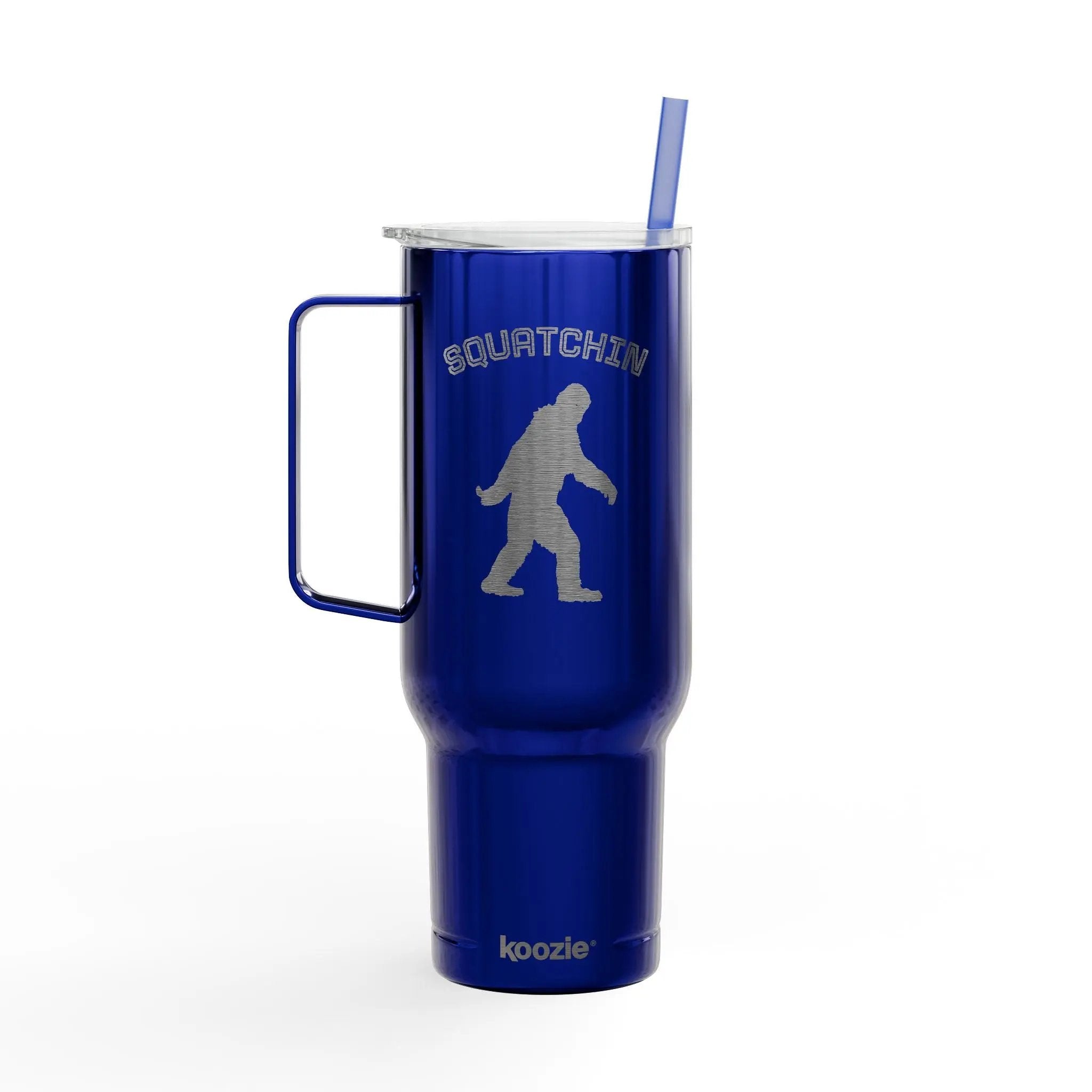 Blue tumbler with 'Squatchin' design and handle on a white background