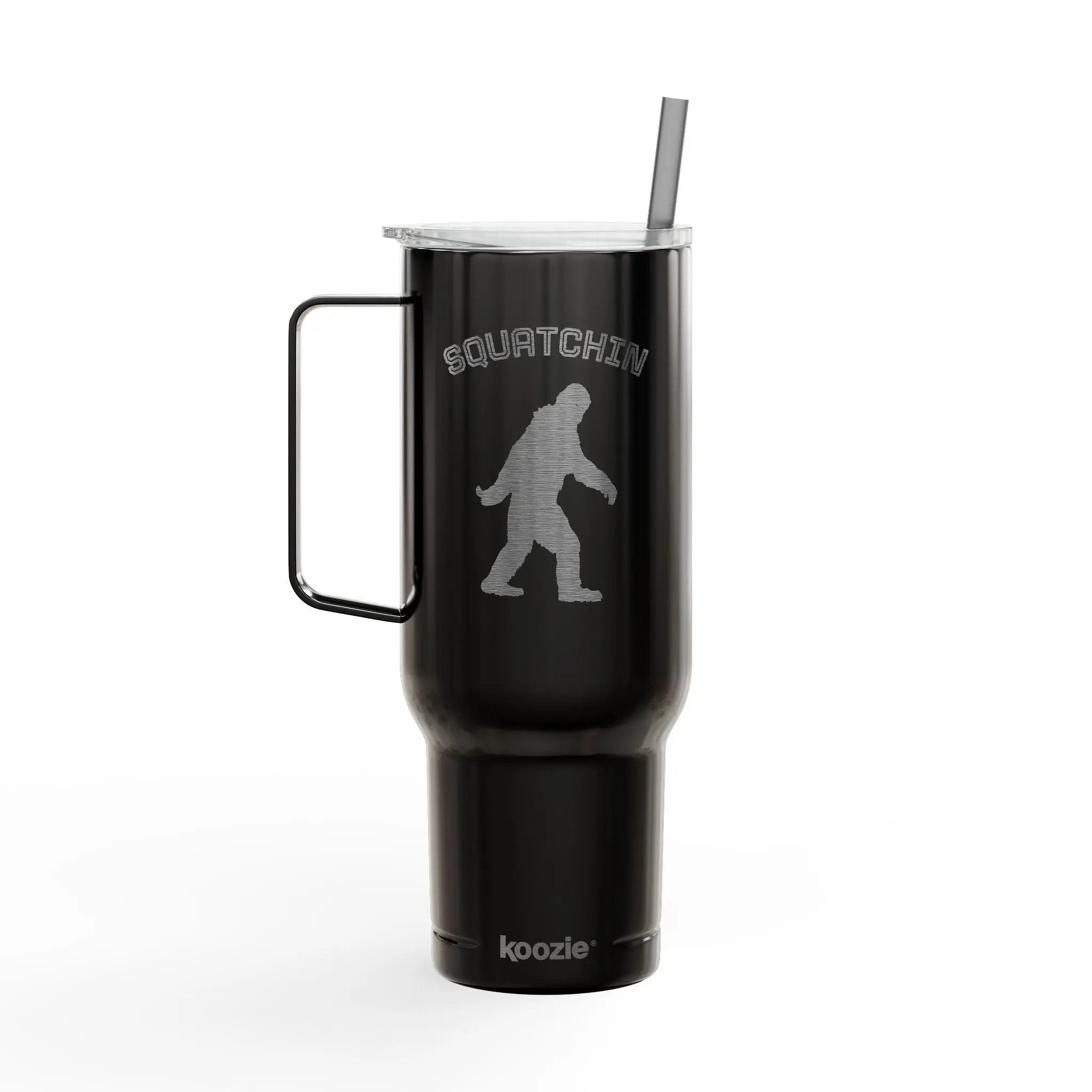 Black tumbler with 'Squatchin' design and handle on a white background