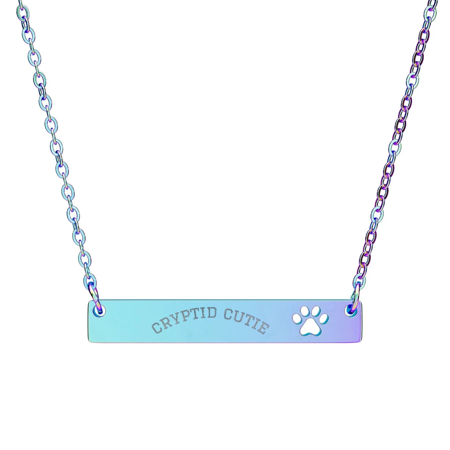 Necklace with 'CRYPTID CUTIE' and paw print on a gradient blue and purple bar, on a white background.