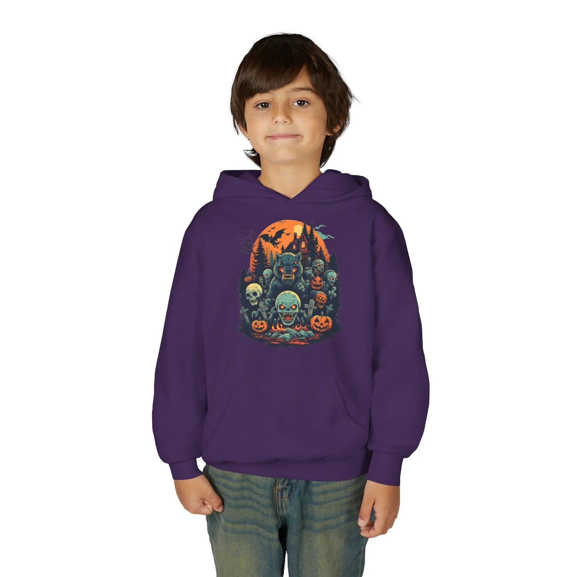 Child wearing a purple hoodie with a colorful Halloween graphic design of werewolves, zombies, and other cryptids on a white background
