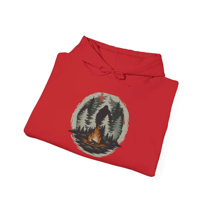 Folded red hoodie with nature graphic on a white background