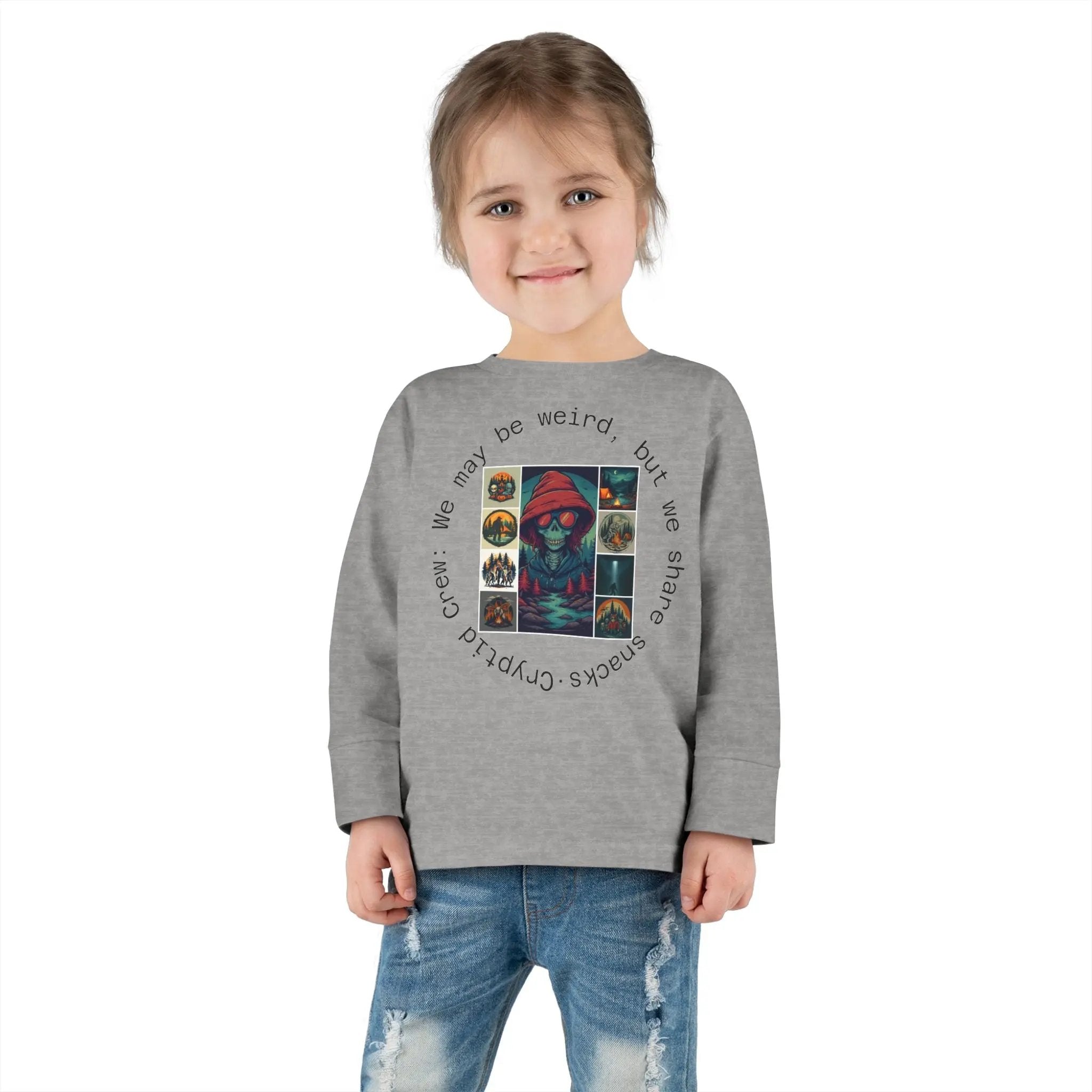 Child wearing a gray sweatshirt with a colorful graphic collage and text on a white background