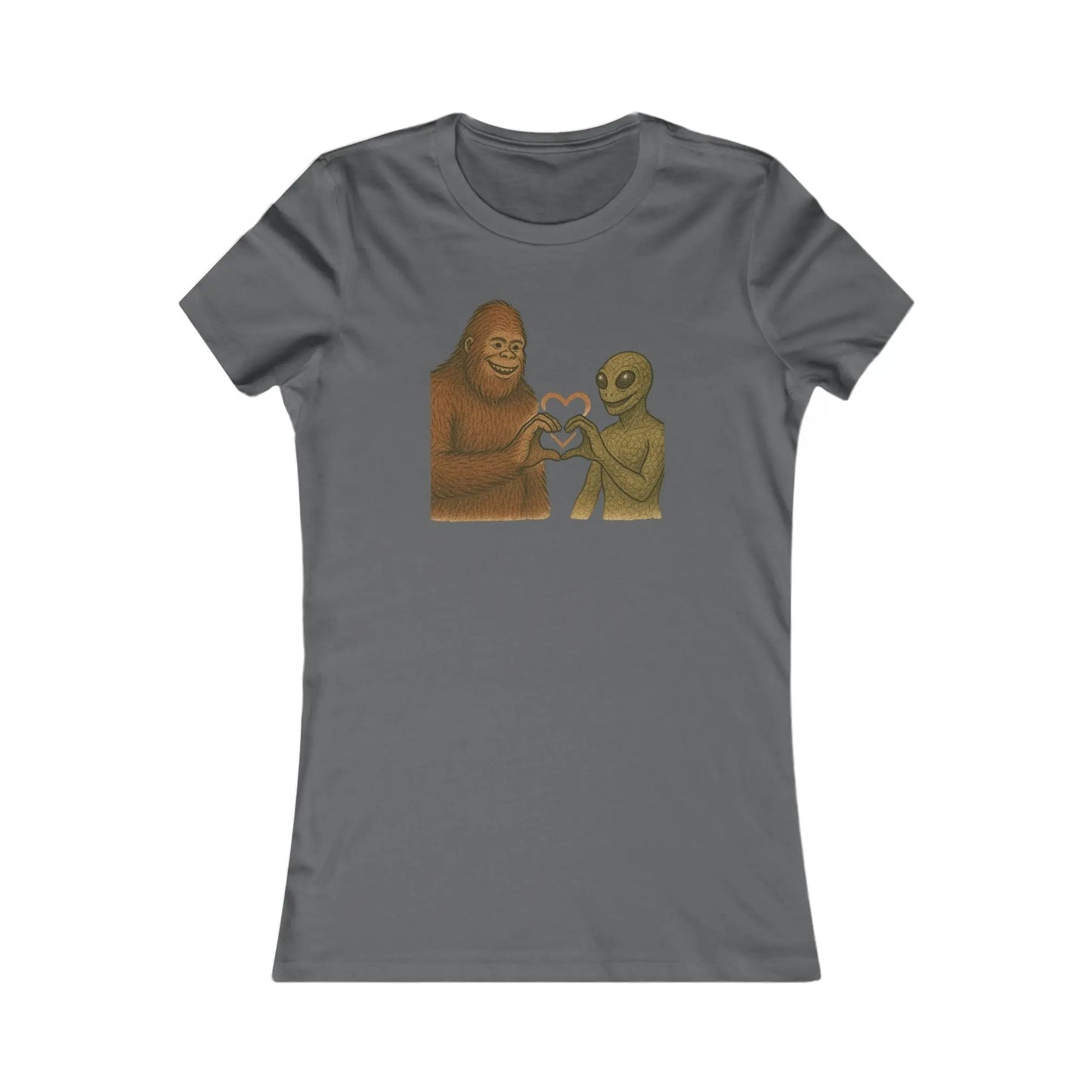 Gray t-shirt with a graphic of a bigfoot and an alien holding hands making a heart symbol on a white background