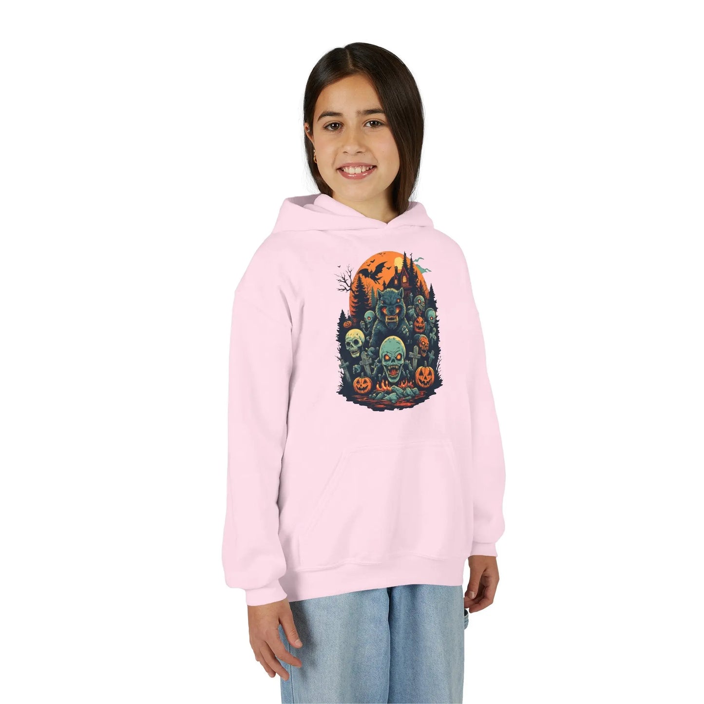 Older child wearing a pink hoodie with a colorful Halloween graphic design of werewolves, zombies, and other cryptids on a white background
