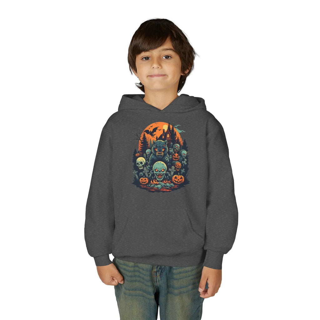 Child wearing a dark gray hoodie with a colorful Halloween graphic design of werewolves, zombies, and other cryptids on a white background