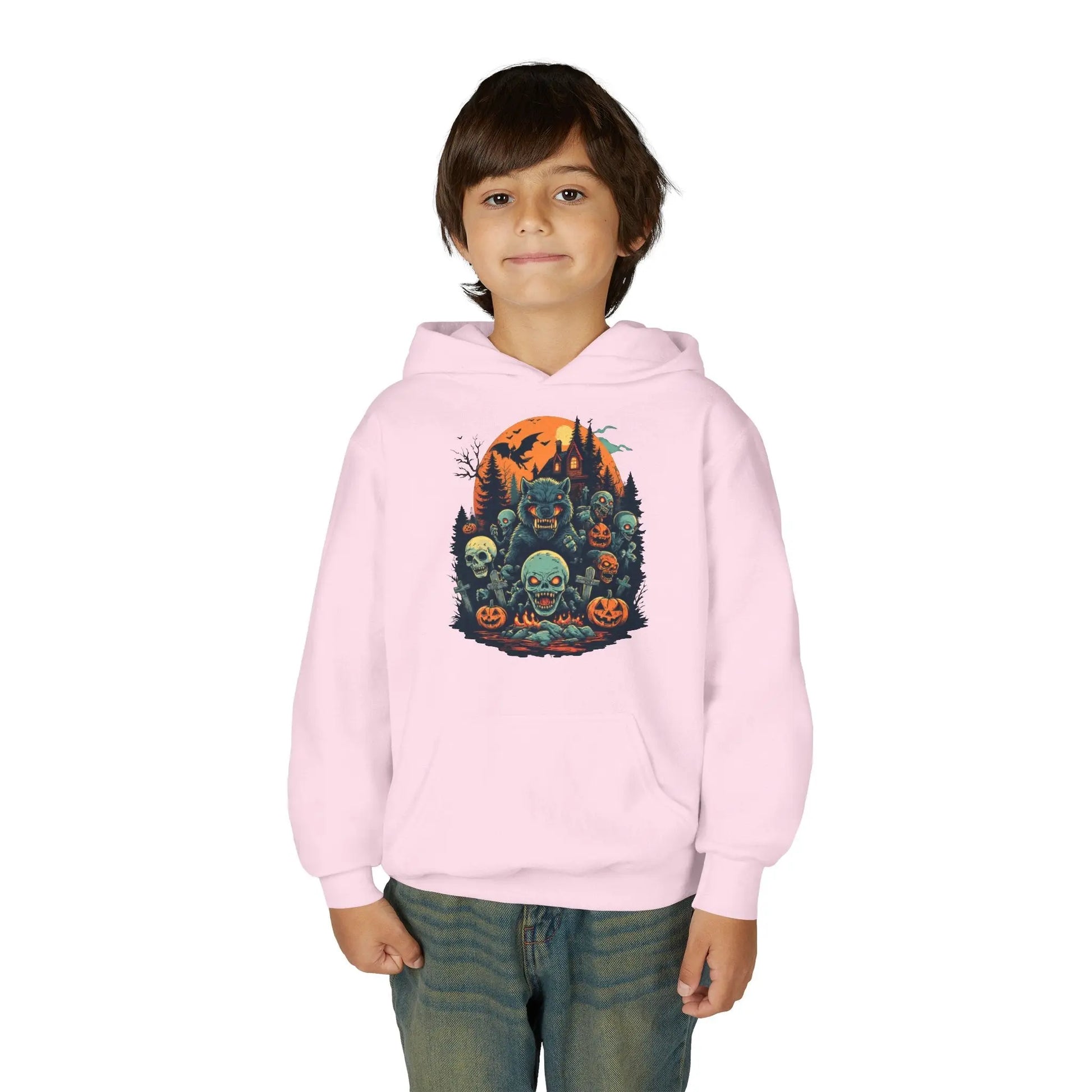 Child wearing a pink hoodie with a colorful Halloween graphic design of werewolves, zombies, and other cryptids on a white background