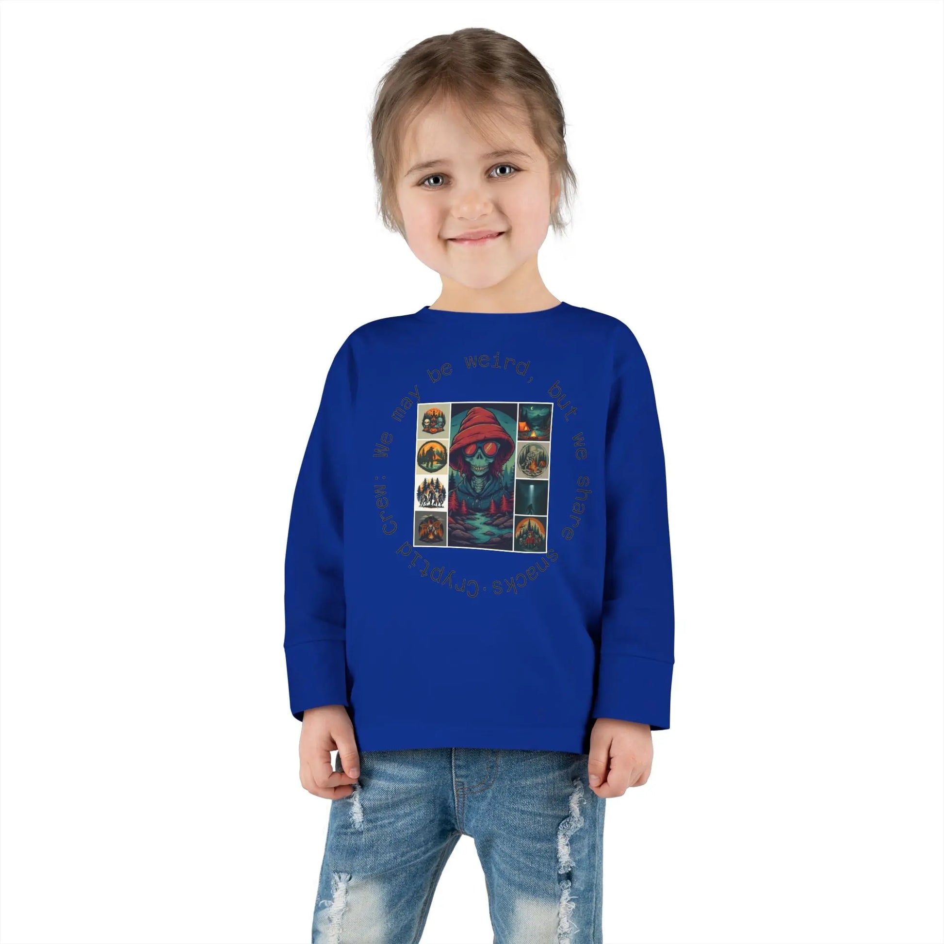 Child wearing a blue long sleeve shirt with a graphic collage design on a white background