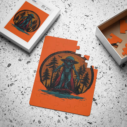 Jigsaw puzzle with a forest-themed design and an alien in a cloak on an orange background, partially completed.