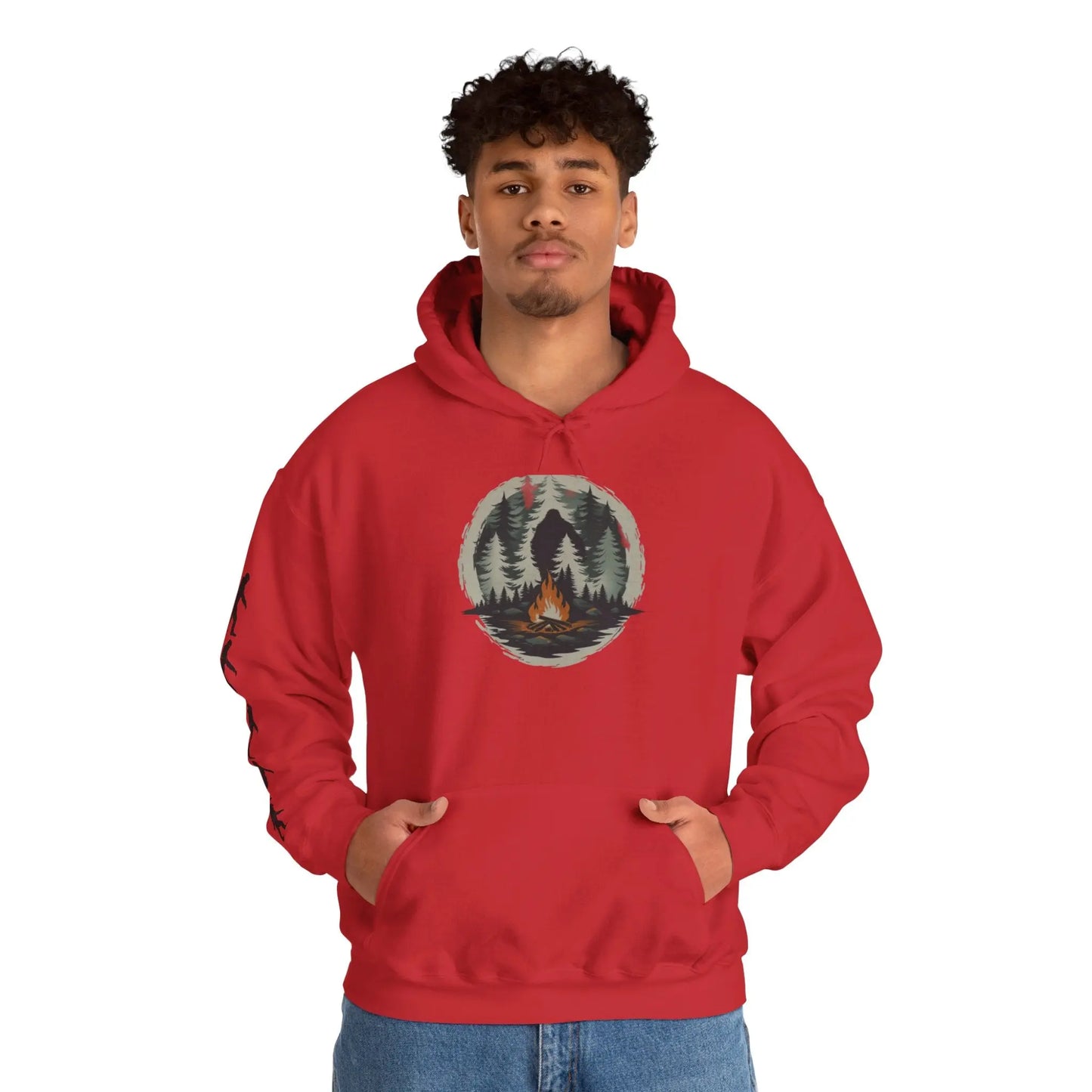 Person wearing a red hoodie with a nature graphic and black bigfoot silhouettes on the right sleeve on a white background on a white background