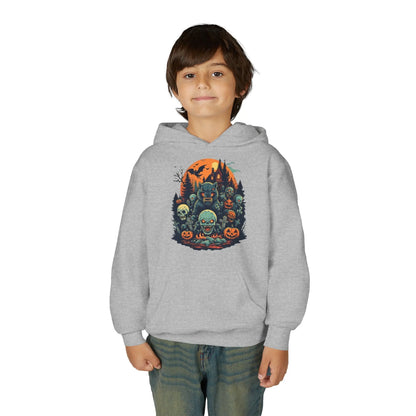 Child wearing a gray hoodie with a colorful Halloween graphic design of werewolves, zombies, and other cryptids on a white background