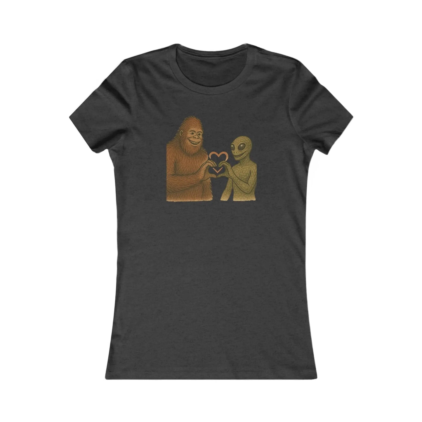 Black t-shirt with a graphic of a bigfoot and an alien holding hands making a heart symbol on a white background
